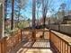 Inviting back deck with a wood railing; perfect for outdoor entertaining and relaxation at 1831 Killarney Sw Dr, Marietta, GA 30008