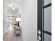 Bright entryway featuring modern lighting and decor, leading into the living area at 3037 Ferrington Way, Smyrna, GA 30080