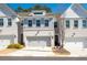 Charming townhome featuring a two-car garage and a welcoming entrance at 3037 Ferrington Way, Smyrna, GA 30080