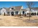 Charming home exterior with a well-maintained lawn and inviting curb appeal at 3037 Ferrington Way, Smyrna, GA 30080