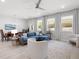 Bright open-concept living room and dining area with hardwood floors at 3037 Ferrington Way, Smyrna, GA 30080