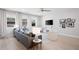 Bright living room with large windows, light colored flooring, and recessed lighting at 3037 Ferrington Way, Smyrna, GA 30080
