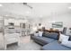 Spacious open-concept living room with kitchen view and hardwood style floors at 3037 Ferrington Way, Smyrna, GA 30080