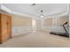 Spacious basement features modern wainscoting and an exercise area at 3510 Estates Landing Nw Dr, Kennesaw, GA 30144