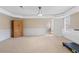 Spacious basement features modern wainscoting and an exercise area at 3510 Estates Landing Nw Dr, Kennesaw, GA 30144