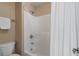 Bathroom with a shower/tub combination and white tile surround at 3510 Estates Landing Nw Dr, Kennesaw, GA 30144