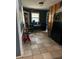 A kitchen featuring tile flooring, black appliances, table and chairs at 4188 Fontana Ct, Tucker, GA 30084