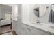 Beautifully renovated bathroom features bright white cabinets and a modern sink at 5245 Wilshire Xing, Cumming, GA 30040