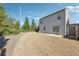 The property's backyard with patio, fenced area and lawn at 110 Centennial Ridge Dr, Acworth, GA 30102