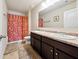 Bathroom features a double sink vanity, a large mirror, and a shower at 110 Centennial Ridge Dr, Acworth, GA 30102