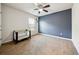 Bright bedroom with a dark accent wall and a ceiling fan at 110 Centennial Ridge Dr, Acworth, GA 30102
