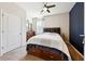 Bedroom with carpet, ceiling fan and a large window allowing natural light at 110 Centennial Ridge Dr, Acworth, GA 30102