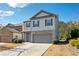 Attractive two-story home with a gray exterior and a convenient two-car garage at 110 Centennial Ridge Dr, Acworth, GA 30102