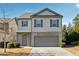 Charming two-story home featuring a two-car garage and well-maintained landscaping at 110 Centennial Ridge Dr, Acworth, GA 30102