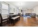 Open concept floor plan featuring a dining area, living room, and hardwood floors at 110 Centennial Ridge Dr, Acworth, GA 30102