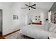 Bright bedroom with vaulted ceilings, a king bed, wood floors, and plenty of natural light at 144 Murray Hill Ne Ave, Atlanta, GA 30317