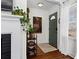 Entryway with hardwood floors, plants and decor at 144 Murray Hill Ne Ave, Atlanta, GA 30317