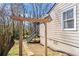 Charming exterior with side entrance and a pergola leading to the backyard at 144 Murray Hill Ne Ave, Atlanta, GA 30317