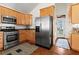 Updated kitchen featuring stainless appliances and access to the side yard at 144 Murray Hill Ne Ave, Atlanta, GA 30317