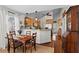 Bright kitchen with wooden cabinets, stainless steel appliances, and breakfast bar at 144 Murray Hill Ne Ave, Atlanta, GA 30317