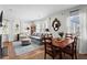 Cozy living room with hardwood floors, natural light, and comfortable seating arrangement at 144 Murray Hill Ne Ave, Atlanta, GA 30317