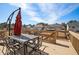 Outdoor back deck with an umbrella and seating set at 2435 Portsmouth Ct, Marietta, GA 30064