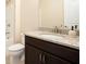 Bathroom features a granite countertop, undermount sink, and shower-tub combo at 2435 Portsmouth Ct, Marietta, GA 30064