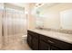 Bathroom with a granite vanity and a shower-tub combo at 2435 Portsmouth Ct, Marietta, GA 30064