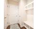 Entryway with mudroom bench, cubbies and tiled rug at 2435 Portsmouth Ct, Marietta, GA 30064