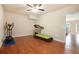 This exercise room features wood floors, a treadmill, and a stationary bike at 2435 Portsmouth Ct, Marietta, GA 30064