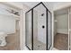 Bathroom featuring a tile shower with a glass surround at 724 Eastwood Rise, Stone Mountain, GA 30087