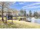 Deer Creek lake with picnic area and fishing pier offering residents tranquil outdoor space at 724 Eastwood Rise, Stone Mountain, GA 30087