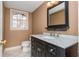 Elegant half bathroom featuring vanity with marble countertop and classic fixtures at 870 Richmond Hill Dr, Marietta, GA 30068