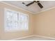 Bedroom with plantation shutter windows and ceiling fan at 870 Richmond Hill Dr, Marietta, GA 30068