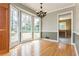 Sun-filled dining room with a large bay window and hardwood flooring at 870 Richmond Hill Dr, Marietta, GA 30068