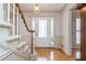 Inviting foyer with hardwood floors, staircase, and a bright, welcoming atmosphere at 870 Richmond Hill Dr, Marietta, GA 30068