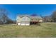 Expansive backyard with a partially fenced area at 1103 Wallington Nw Ct, Conyers, GA 30012