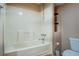 Full bathroom features a tub, shower, and toilet with a functional design at 1103 Wallington Nw Ct, Conyers, GA 30012