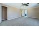 Bedroom view includes a closet, neutral walls, and a ceiling fan at 1103 Wallington Nw Ct, Conyers, GA 30012