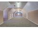 Large bonus room with built in storage and neutral carpet at 1103 Wallington Nw Ct, Conyers, GA 30012