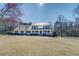 Charming two-story home with a metal roof and inviting front porch at 1103 Wallington Nw Ct, Conyers, GA 30012