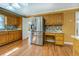 Well-equipped kitchen with stainless steel appliances and wooden cabinets at 1103 Wallington Nw Ct, Conyers, GA 30012