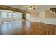 This open concept living room is light and airy, with a wood-burning stove and wood-look flooring at 1103 Wallington Nw Ct, Conyers, GA 30012
