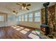 Inviting living room boasts hardwood floors, stone fireplace and bright, natural light at 1103 Wallington Nw Ct, Conyers, GA 30012