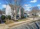 Charming two-story house with a well-manicured lawn, curb appeal, and inviting front porch at 113 Plumeria St, Canton, GA 30114