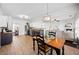 Open kitchen and breakfast nook leads to comfortable living room at 113 Plumeria St, Canton, GA 30114