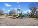 Community playground featuring a slide, climbing structures, and benches for parents at 113 Plumeria St, Canton, GA 30114
