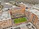 Aerial view of Ponce City Market, showcasing its brick architecture and green rooftop at 970 Drewry Ne St, Atlanta, GA 30306