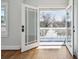 View of a balcony through glass paneled doors and hardwood floors at 970 Drewry Ne St, Atlanta, GA 30306