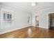 Bedroom with hardwood floors, neutral walls, and ensuite bathroom and walk in closet at 970 Drewry Ne St, Atlanta, GA 30306